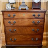 F23. Four-drawer mahogany chest.